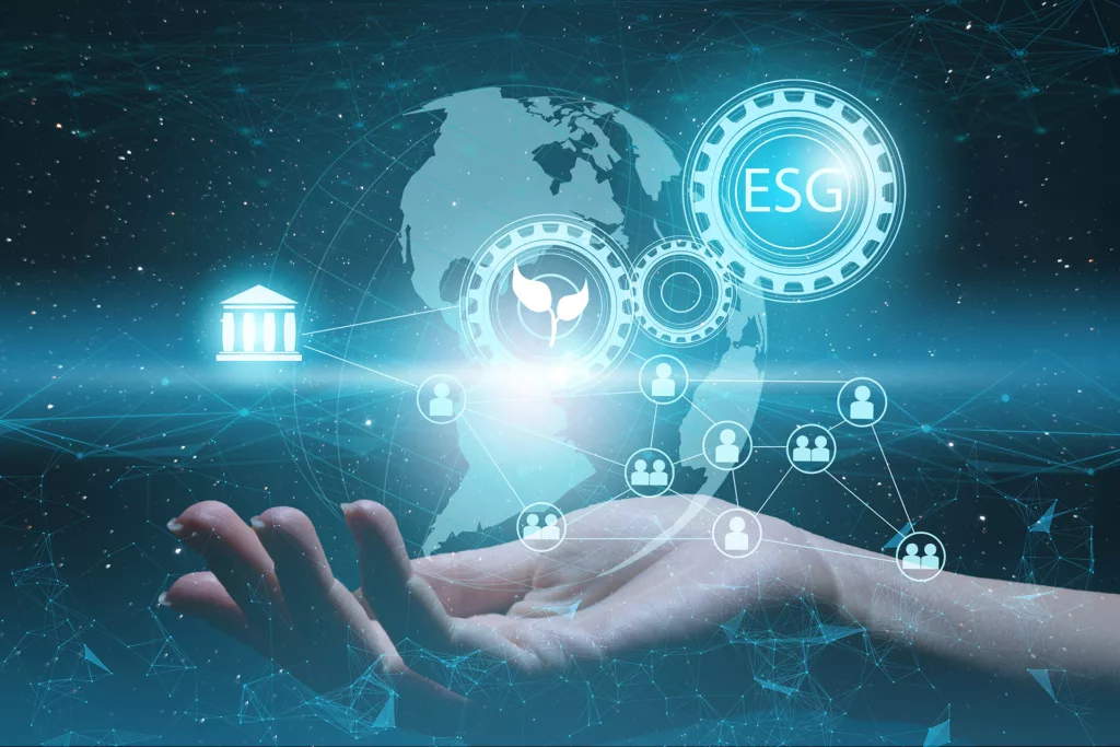 Hand palm up holding globe with icons of ESG